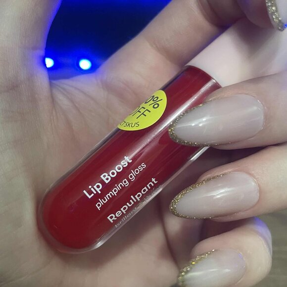 Plumping lip gloss - Picture 2 of 3